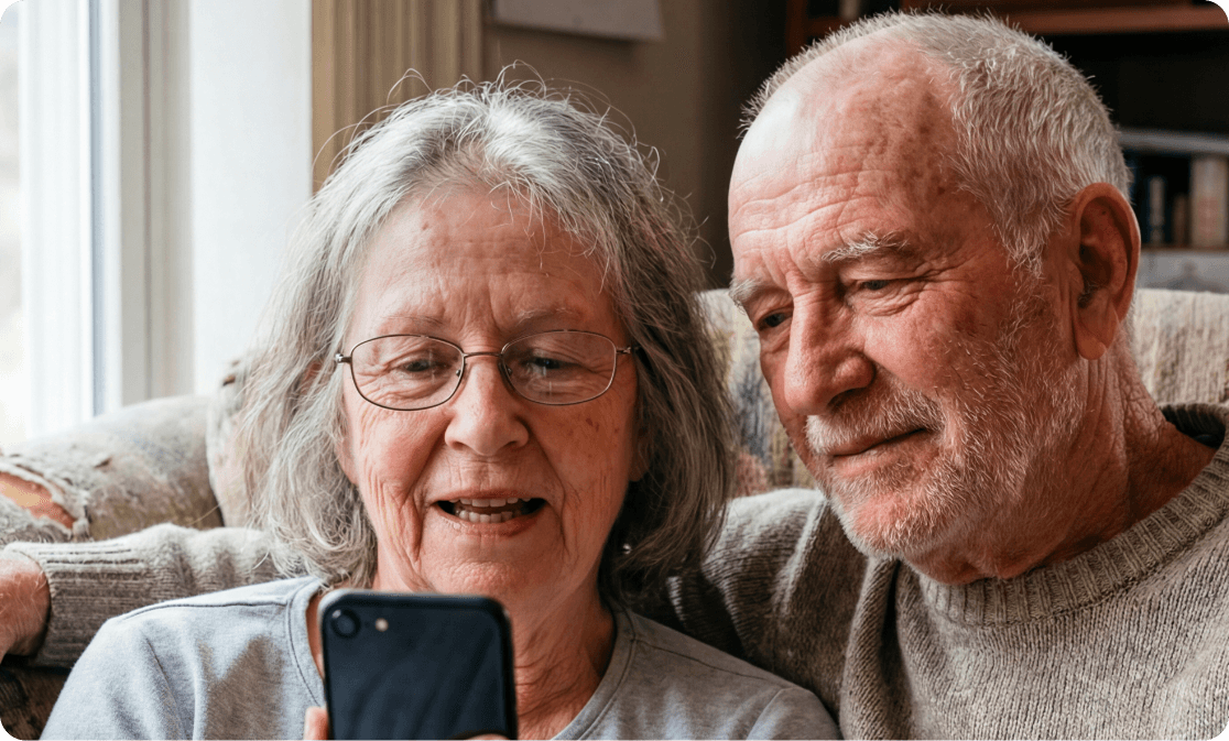 Elderly couple using Dora on phone